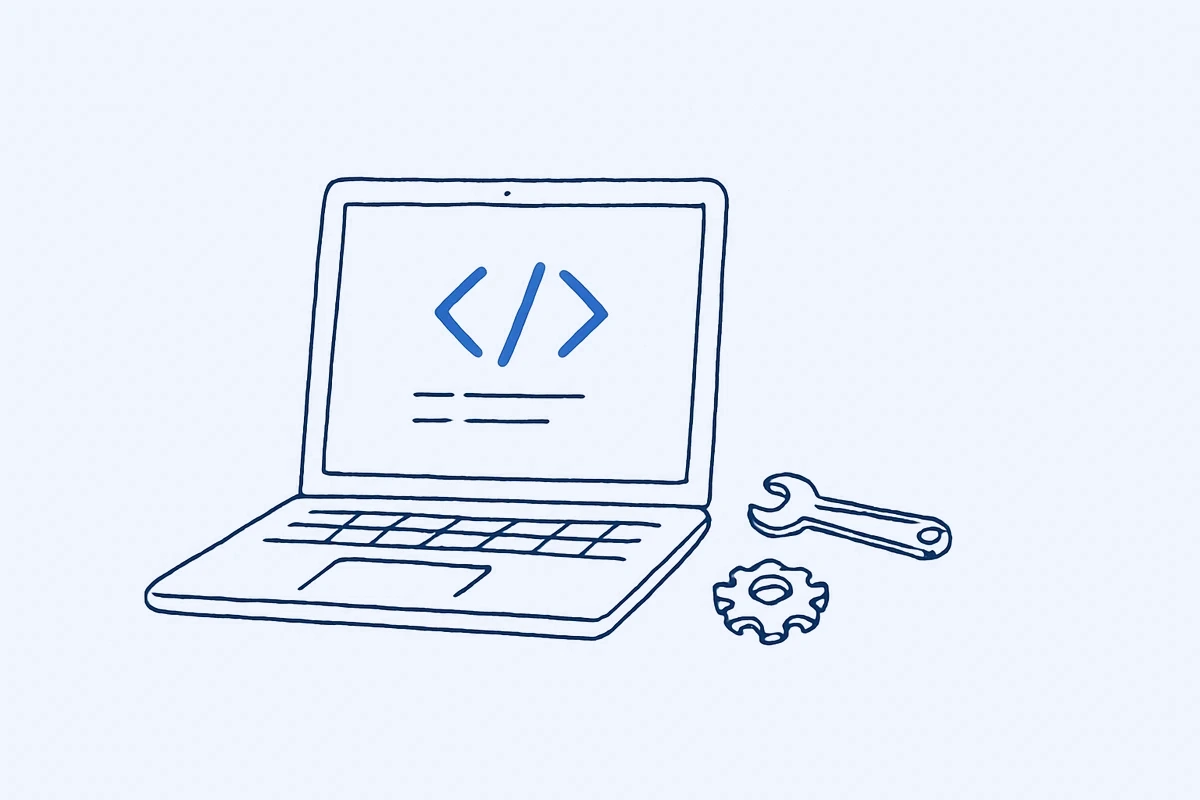 コードが表示されたラップトップと工具のイラスト